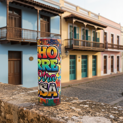 Colorful tumbler with text held by a hand on a white background